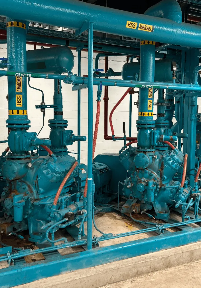 Industrial ammonia refrigeration compressor room serviced by Great Lakes Refrigeration